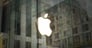 A photo of the Apple logo inside an Apple store