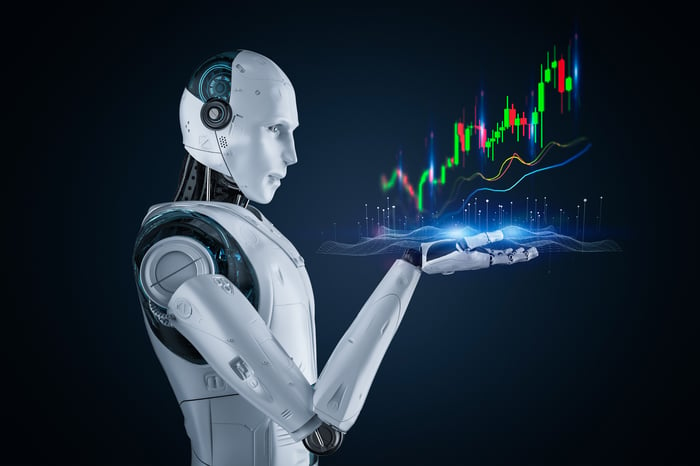 A hologram of a rising candlestick stock chart coming from the upward-facing right palm of a humanoid robot.